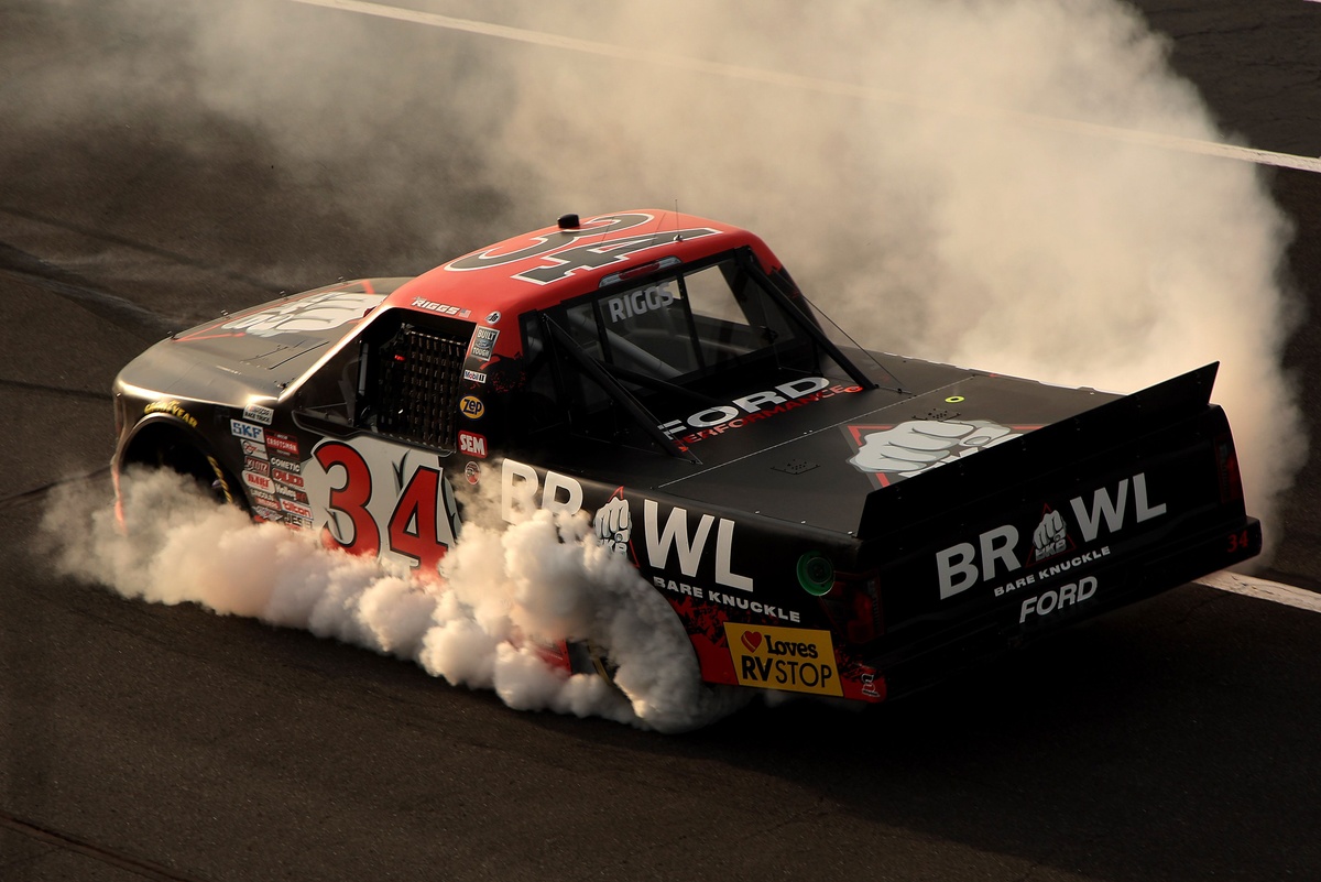 At Pocono Raceway, Layne Riggs of Front Row Motorsports drove his No. 34 Ford to a victory with a lead of 3.6 seconds over runner-up Tanner Gray. This marked Riggs as the first Ford driver to achieve this feat