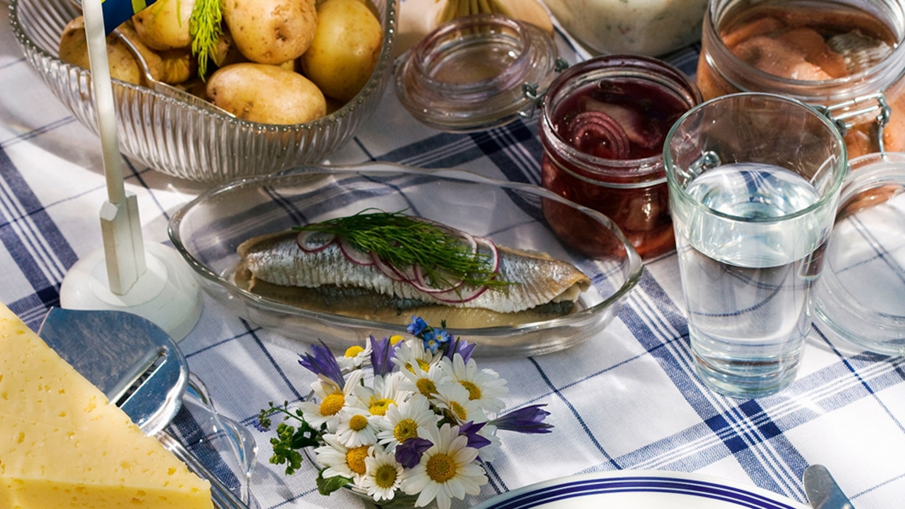The Swedish tradition of summer and fertility is celebrated with a grand smorgasbord, lively maypole dancing, and late-night festivities