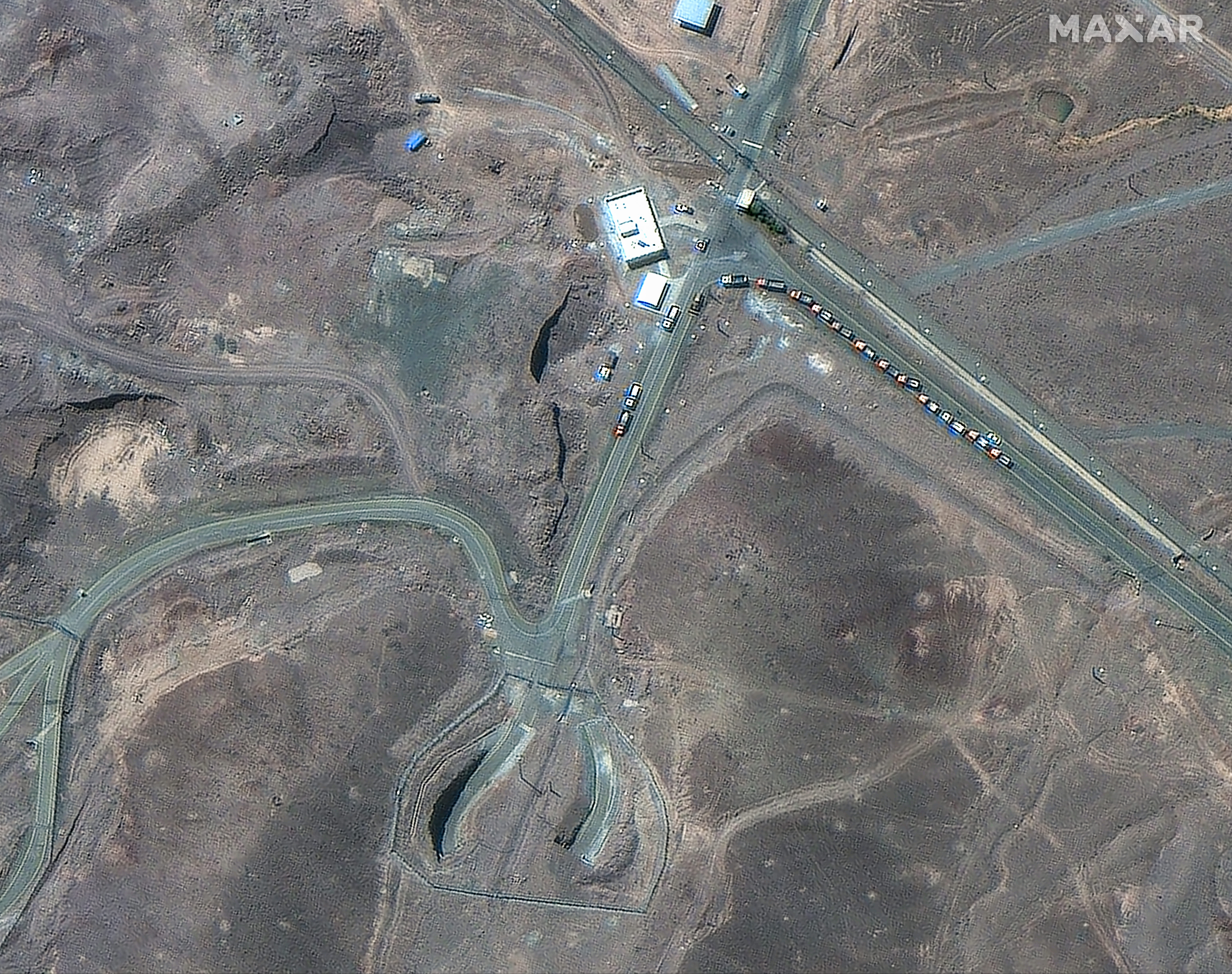 Maxar Technologies released satellite imagery showing activity at Irans Fordo nuclear facility before U.S. air strikes. The images reveal increased movement and construction at the site, raising concerns about Irans nuclear capabilities. This development has sparked international concern and calls for further investigation